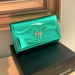 Giuseppe Zanotti Clutch with detachable chain